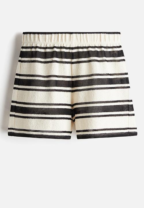 H&M - Knitted shorts - cream/black striped 