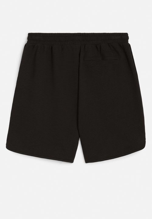 PUMA - CLASSICS Waffle Shorts 7 - PUMA Black