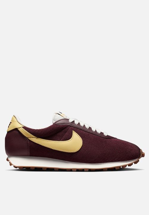nike maroon and gold shoes