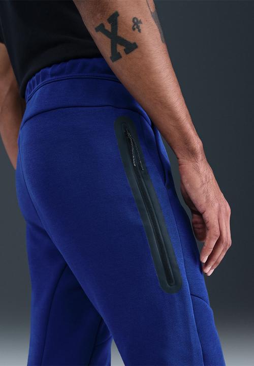 nike tech fleece joggers blue and black