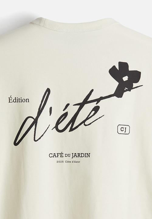 H&M - Coolmax® regular fit T-shirt - cream/édition d'été