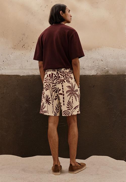 H&M - Relaxed fit patterned shorts - white/palm trees