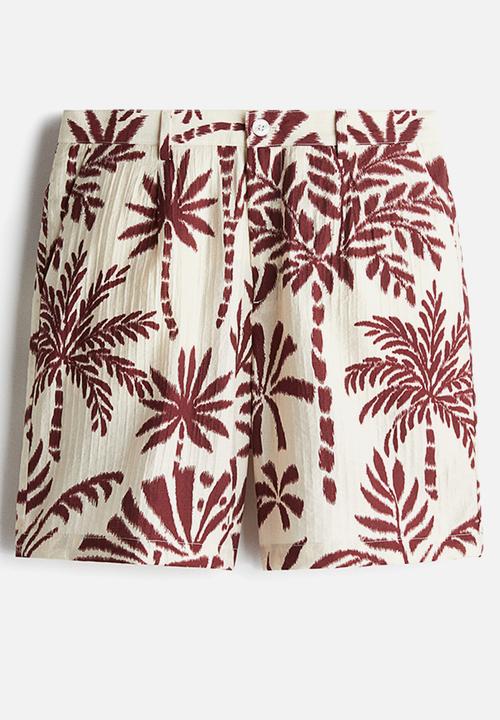 H&M - Relaxed fit patterned shorts - white/palm trees