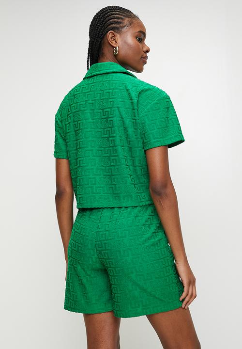 Steve Madden - Ladies bella embossed logo jogger shorts - emerald green