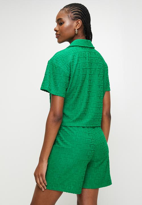 Steve Madden - Ladies tessa embossed logo top with collar - emerald green