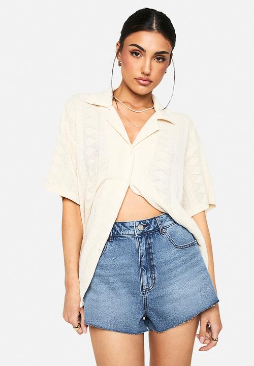 boohoo - Raw hem denim short - mid wash