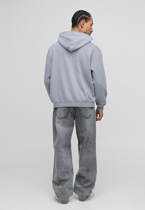 boohooMAN - Relaxed Fit WRLDWD Applique Washed Jeans - Ecru