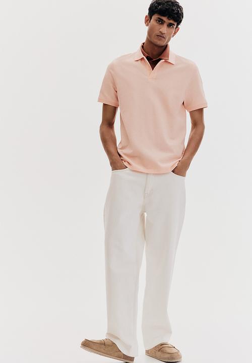 H&M - Regular fit piqué polo shirt - orange