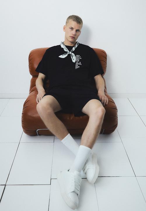 H&M - Loose fit printed t-shirt - black & beverly hills