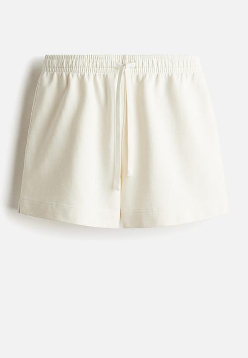 H&M - Washed cotton sweatshorts - cream