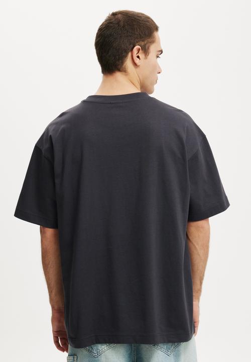 Cotton On - Box Fit Graphic T-shirt - Ink Navy/Own Luck