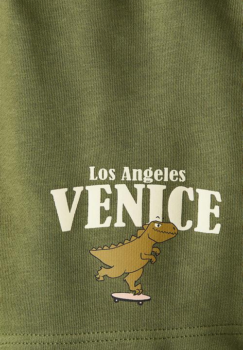 H&M - Printed sweatshorts - dark green/venice