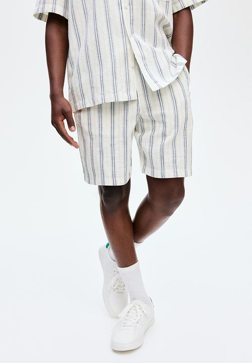 H&M - Cotton shorts - light blue/white striped 