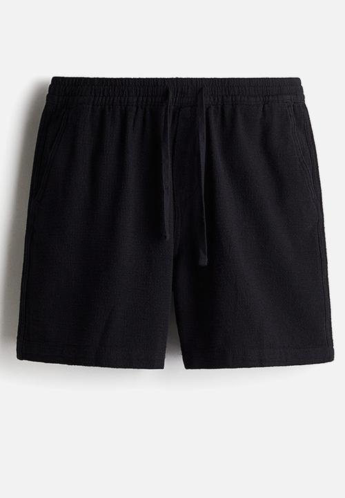 H&M - Regular fit woven shorts - dark blue