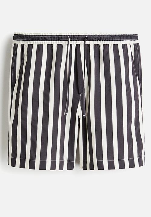 H&M - Regular fit shorts - black & white striped 