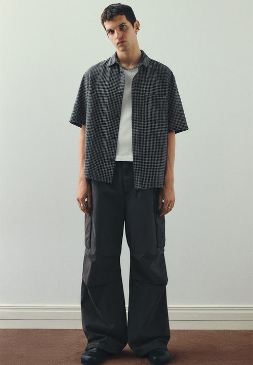 H&M - Oversized fit short-sleeved linen-blend shirt - black checked