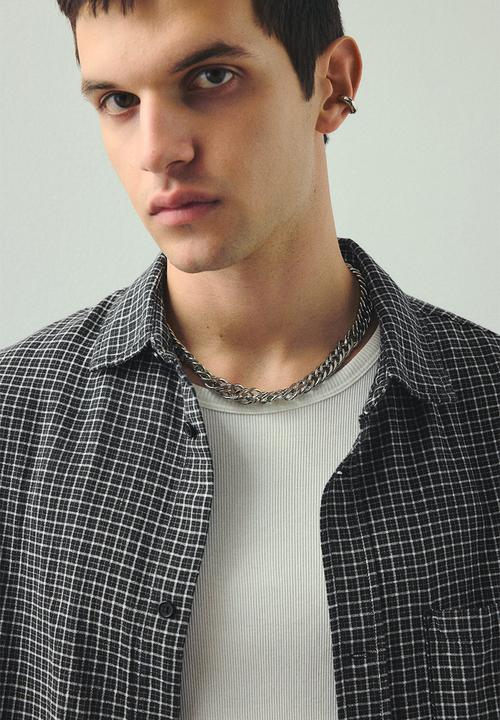 H&M - Oversized fit short-sleeved linen-blend shirt - black checked