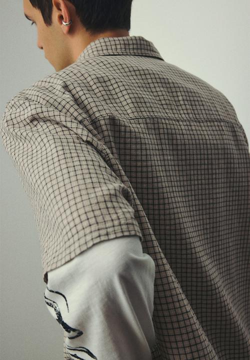 H&M - Oversized fit short-sleeved linen-blend shirt - beige checked