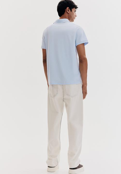 H&M - Slim fit polo shirt - light blue