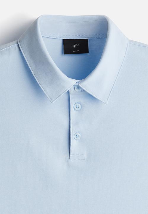 H&M - Slim fit polo shirt - light blue