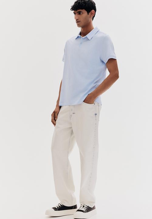 H&M - Slim fit polo shirt - light blue