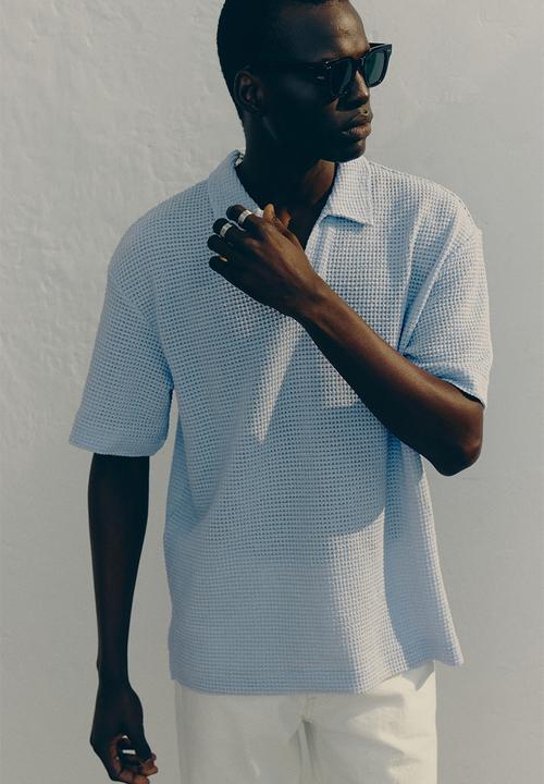 H&M - Loose fit waffled polo shirt - light blue