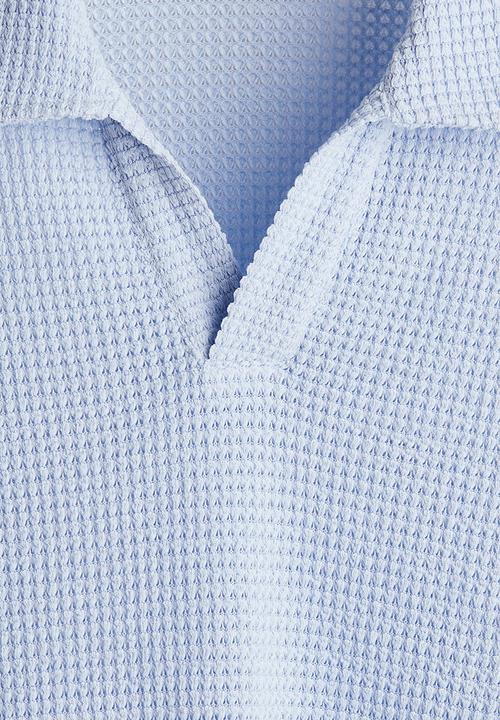 H&M - Loose fit waffled polo shirt - light blue