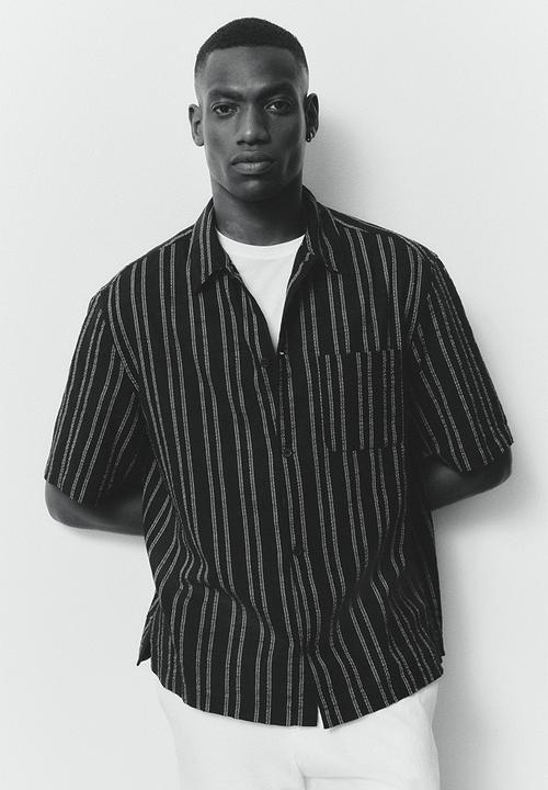 H&M - Regular fit short-sleeved shirt - black/striped