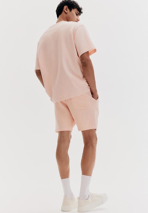 H&M - Regular fit sweatshorts - peach pink