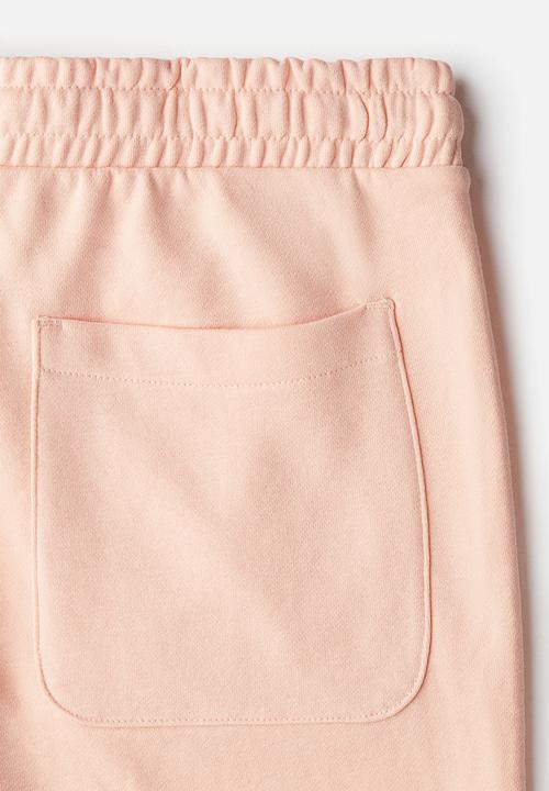 H&M - Regular fit sweatshorts - peach pink
