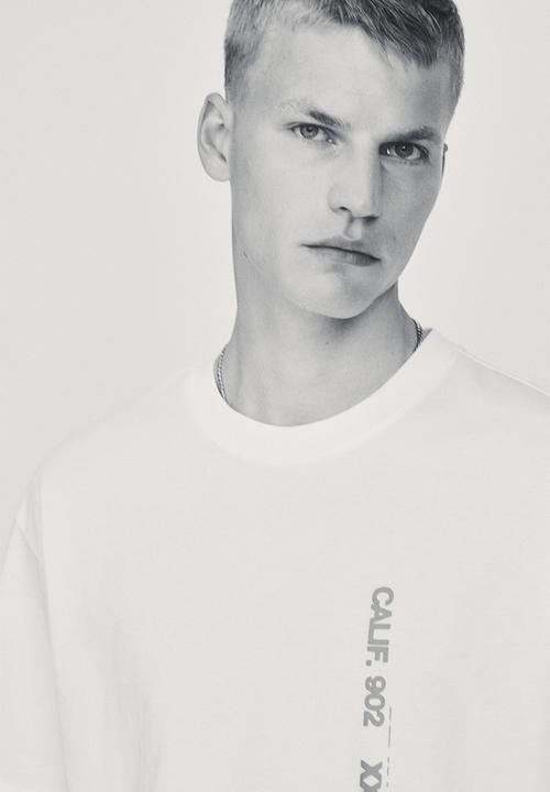 H&M - Loose fit printed T-shirt - white/calif