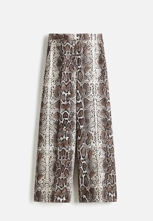 H&M - Wide tailored trousers - mole/snakeskin pattern