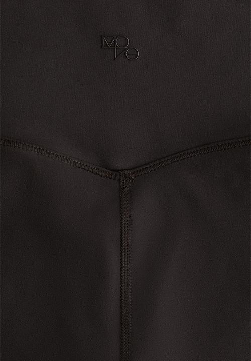 H&M - Sports cycling shorts with softmove™ - brown
