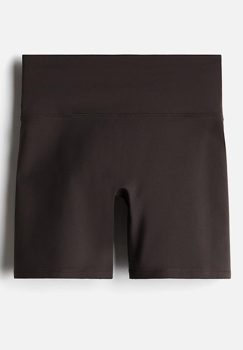 H&M - Sports cycling shorts with softmove™ - brown