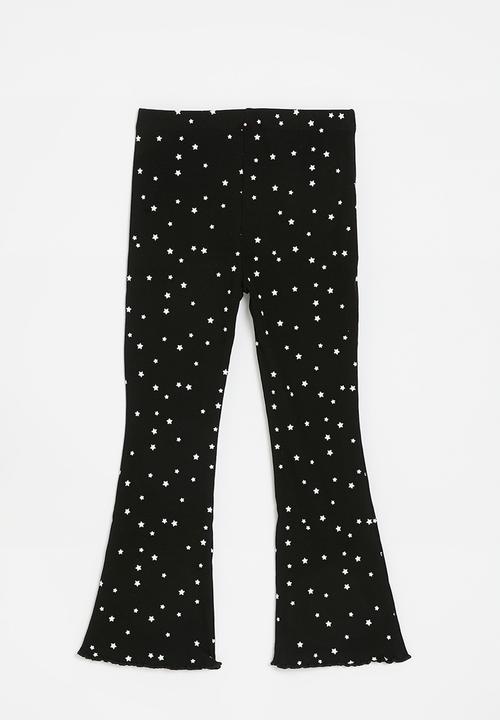 Pop Candy - Flared leggings - black stars