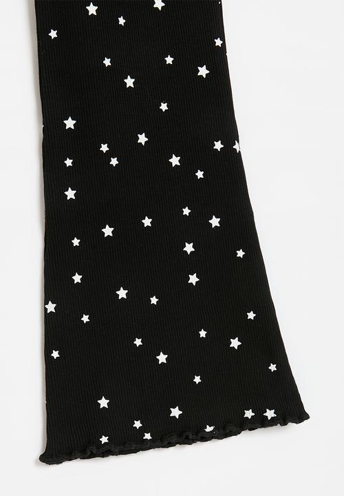 Pop Candy - Flared leggings - black stars