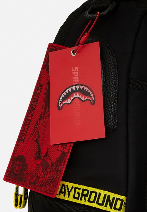Sprayground - Shark central yellow tape dlx satin backpack- black