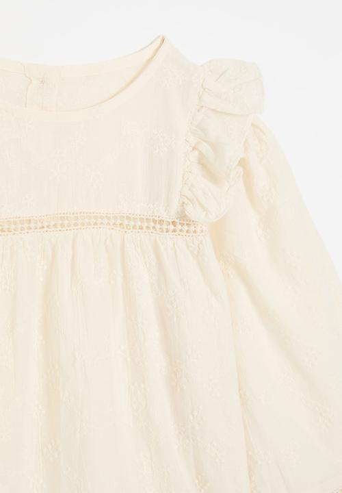 Pop Candy - Ruffle sleeve top - off white