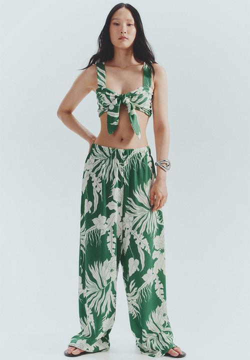 H&M - Wide trousers - green/white floral