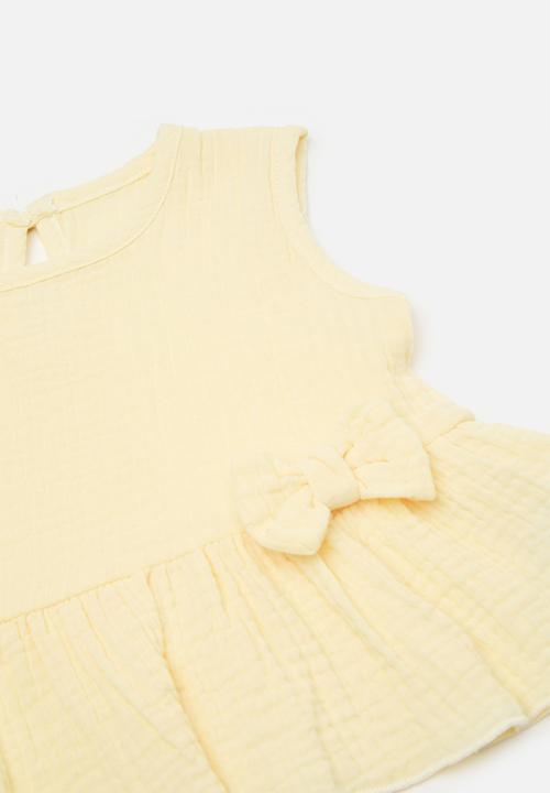 Pop Candy - Peplum top with bow detail & frilled hem shorts - lemon chiffon