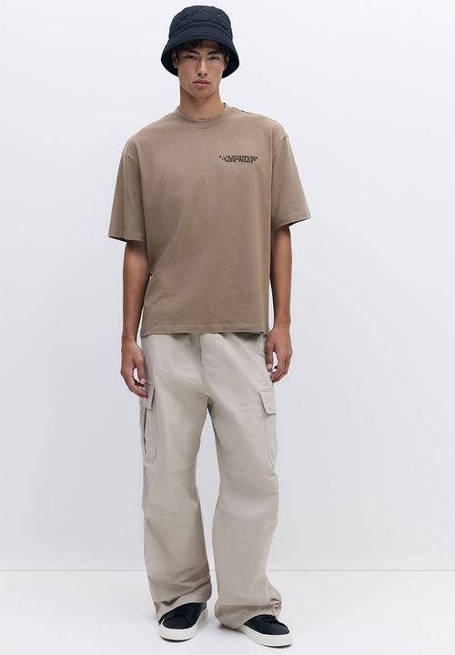 H&M - Loose fit washed t-shirt - dark beige le triangle d'or 