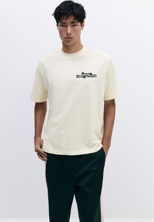 H&M - Loose fit washed t-shirt - beige/avenue