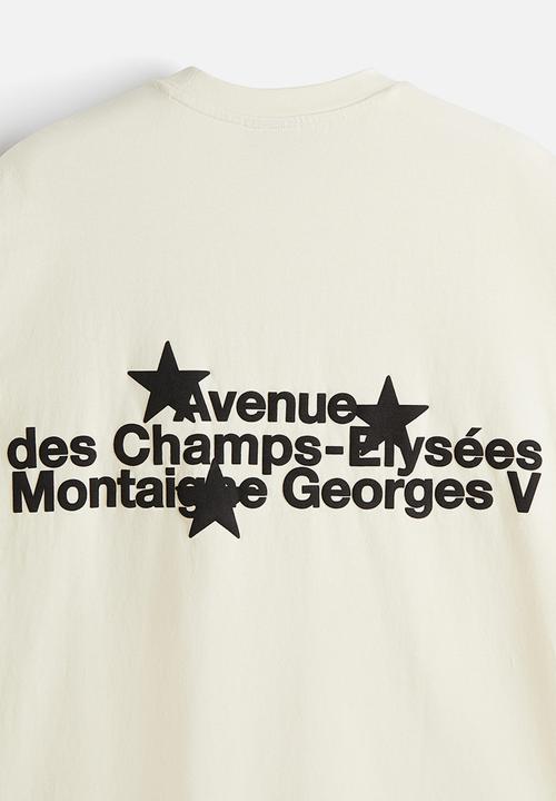 H&M - Loose fit washed t-shirt - beige/avenue