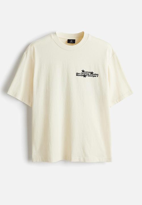 H&M - Loose fit washed t-shirt - beige/avenue