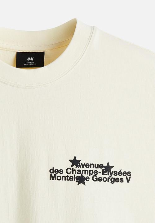 H&M - Loose fit washed t-shirt - beige/avenue