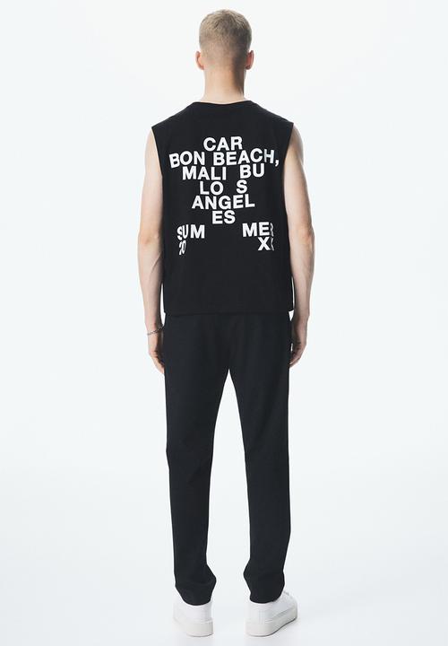 H&M - Slim fit trousers - black