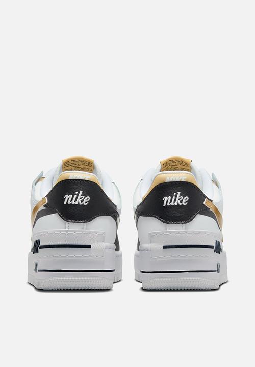 nike black gold white shoes