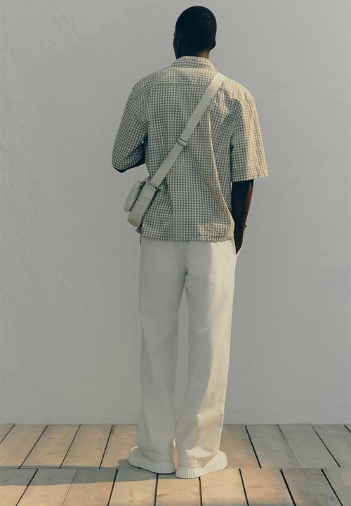 H&M - Relaxed fit cotton trousers - cream