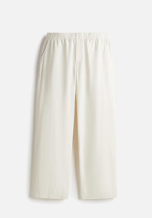 H&M - Relaxed fit cotton trousers - cream