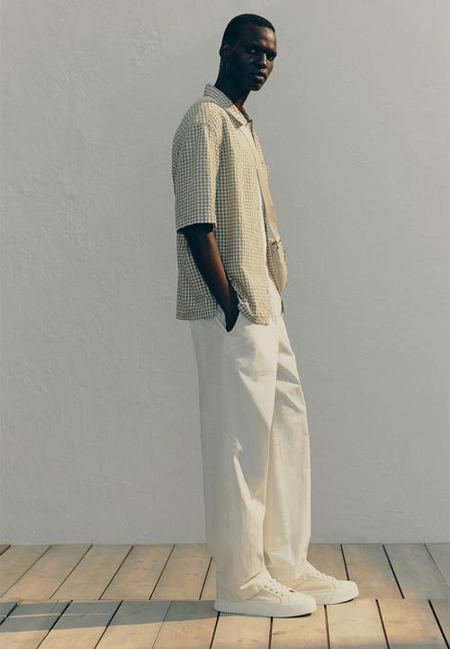 H&M - Relaxed fit cotton trousers - cream